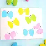 Sponge Painted Butterflies - Cultivating Brilliant Minds butterfly sponge painting that has different colored butterflies