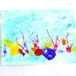 Coral Blow Painting With Straws - Cultivating Brilliant Minds a coral blow painting with straws that has a watercolor background and coral made by blowing paint through a straw