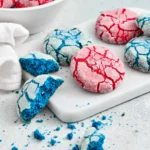 red and blue crinkle cookies on a white board
