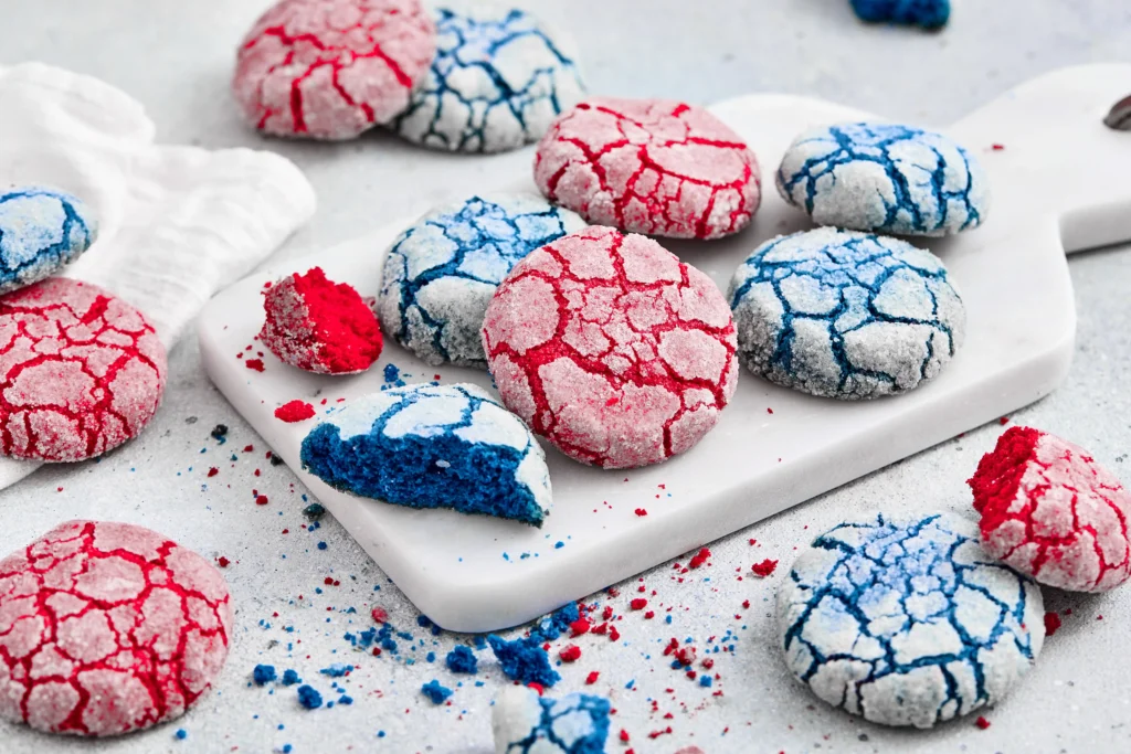 red and blue crinkle cookies on a white board
