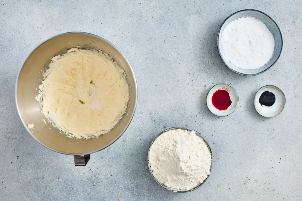 cookie dough for the crinkle cookies in a mixing bowl