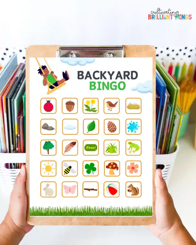 Clipboard bingo card titled Backyard Bingo with 20+ small nature icons like leaves, animals, sun, bird, mushroom, etc.