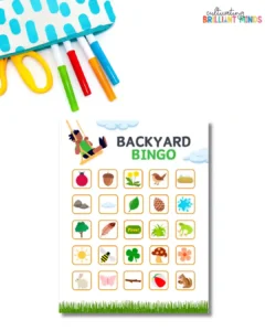 Backyard Bingo activity page with a grid of nature icons and a grassy bottom edge, plus craft supplies in the corner.