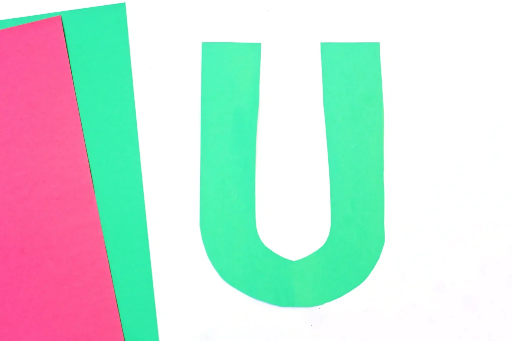 letter U cut out of green construction paper for this U is for umbrella paper craft