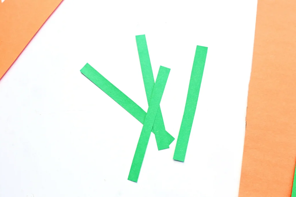 strips of green construction paper for this flower craft for kids
