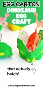 Colorful painted egg-cartons with toy dinosaurs inside on a white surface with a paint plate nearby.