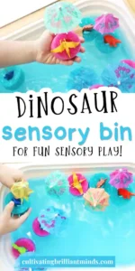 a bin filled with blue water and pool noodle slices with toy dinosaurs and mini umbrellas