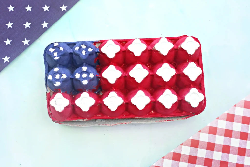 an egg carton american flag craft that is a painted egg carton that looks like the flag