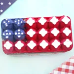 an egg carton american flag craft that is a painted egg carton that looks like the flag
