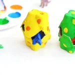 Close-up of colorful egg carton cups with polka-dots