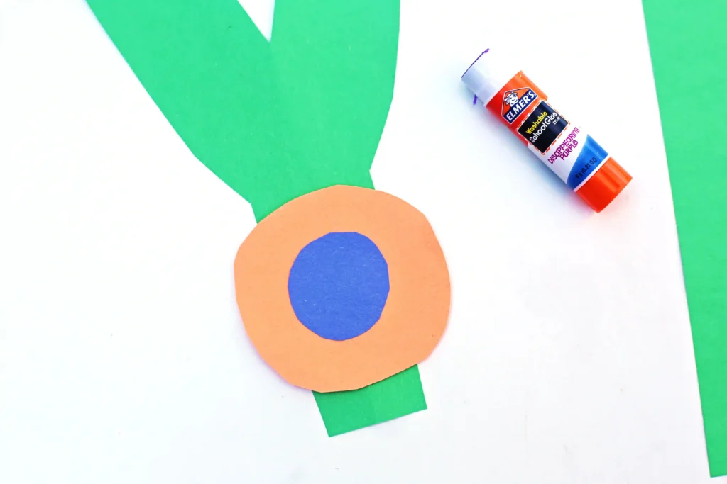 a letter y cut out of green construction paper with an orange and blue circle glued on to look like a yo-yo