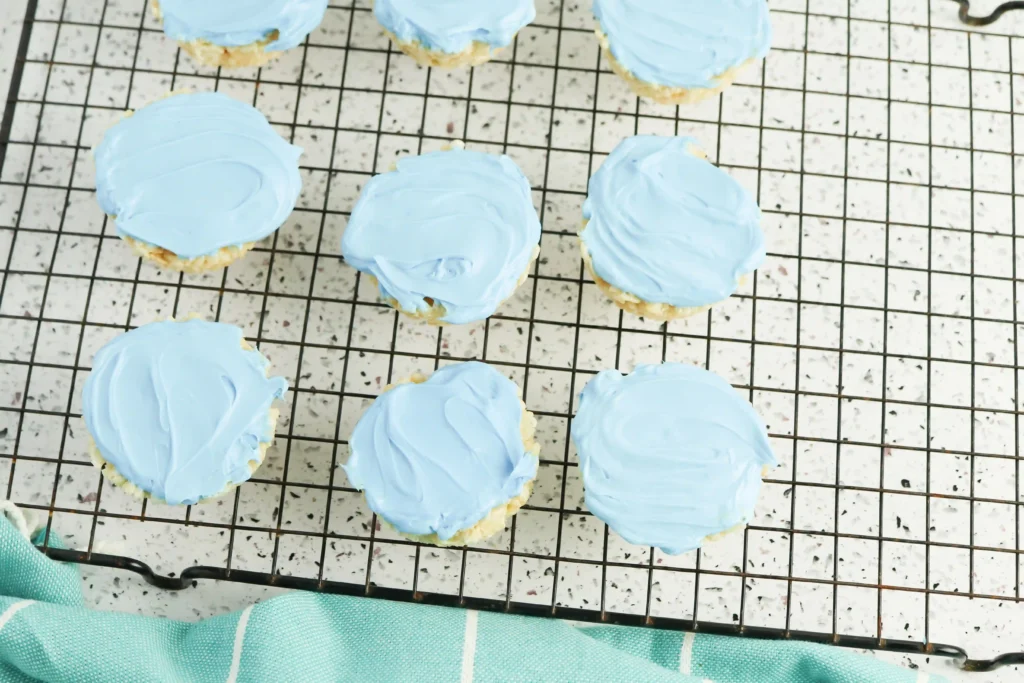 rice krispie treats with blue icing on top