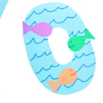 a letter O cut out of blue paper with blue waves drawn on and colorful paper fish glued on top