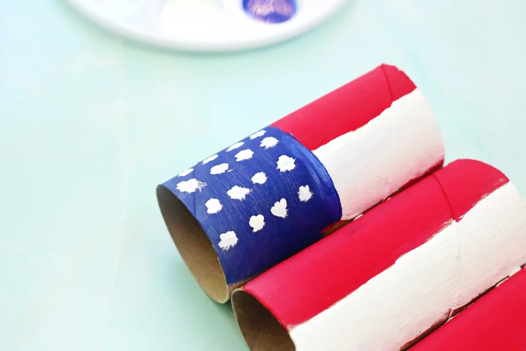 Toilet Paper Roll American Flag - Cultivating Brilliant Minds a memorial day craft that has toilet paper rolls glued together and painted to look like an American flag