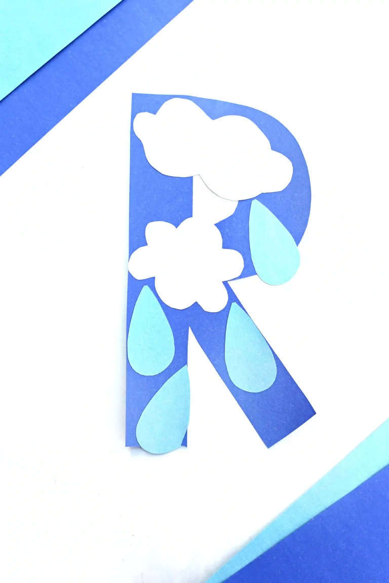 rainy day craft with a letter R cut out of blue construction paper with rain drops and clouds