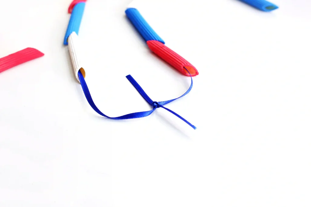 Patriotic Pasta Necklaces - Cultivating Brilliant Minds a patriotic necklace that has dyed pasta threaded on string