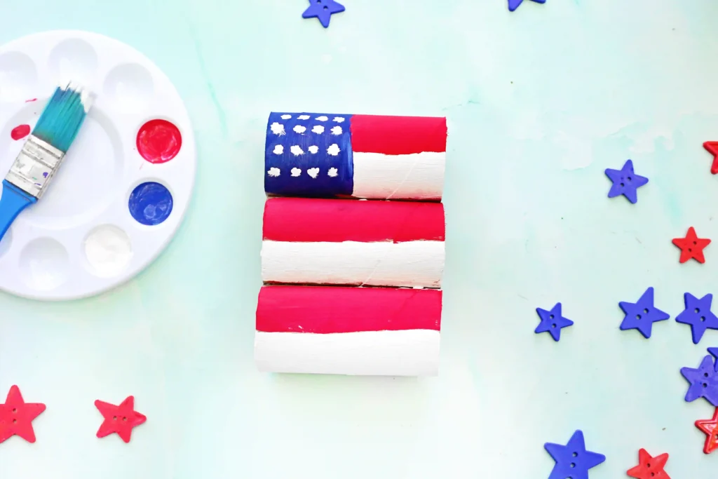 Toilet Paper Roll American Flag - Cultivating Brilliant Minds a Toilet Paper Roll American Flag craft that has toilet paper rolls glued together and painted to look like an American flag