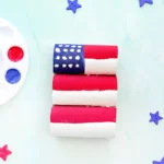 a Toilet Paper Roll American Flag that has toilet paper rolls glued together and painted to look like an American flag