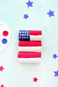 a Toilet Paper Roll American Flag that has toilet paper rolls glued together and painted to look like an American flag