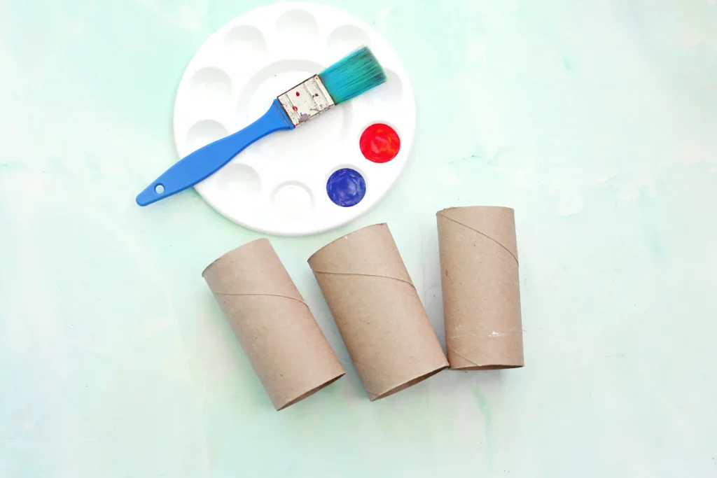 Toilet Paper Roll American Flag - Cultivating Brilliant Minds supplies for this patriotic craft- 4 toilet paper rolls, red, white, and blue paint, and a paintbrush