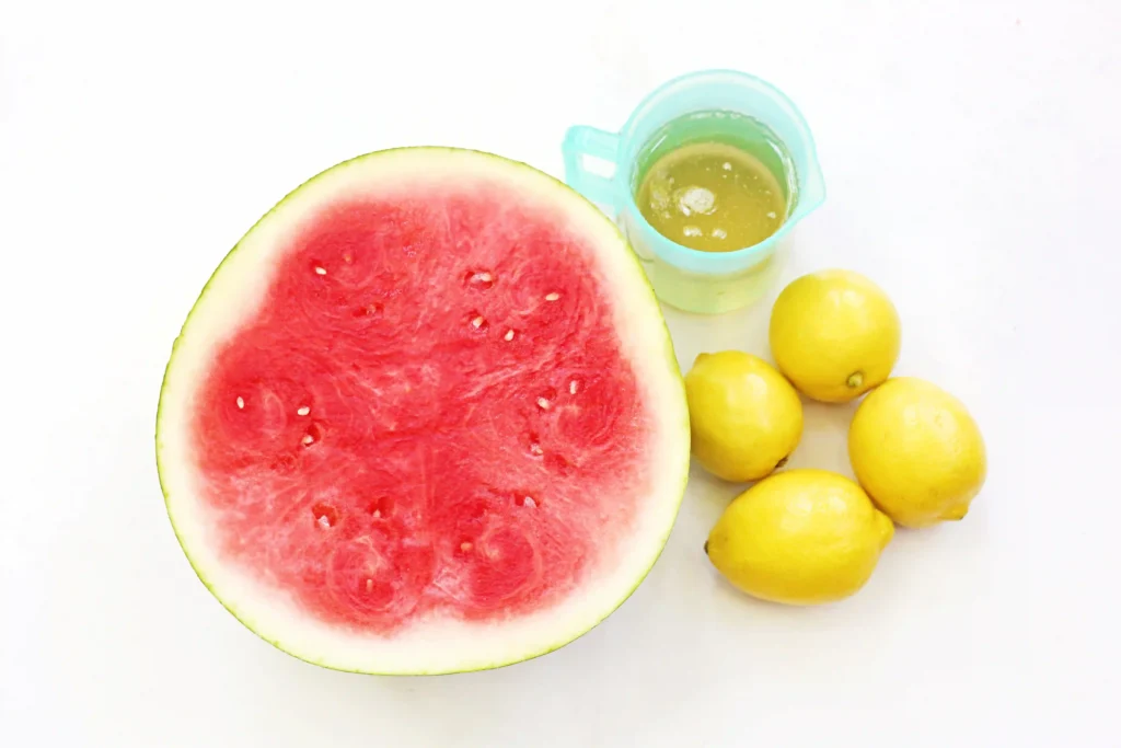 ingredients for the Watermelon Lemonade: watermelon, lemons, and simple syrup