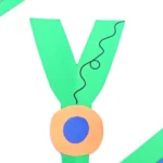 a letter y craft that has a letter y cut out of green construction paper and a construction paper yoyo attached