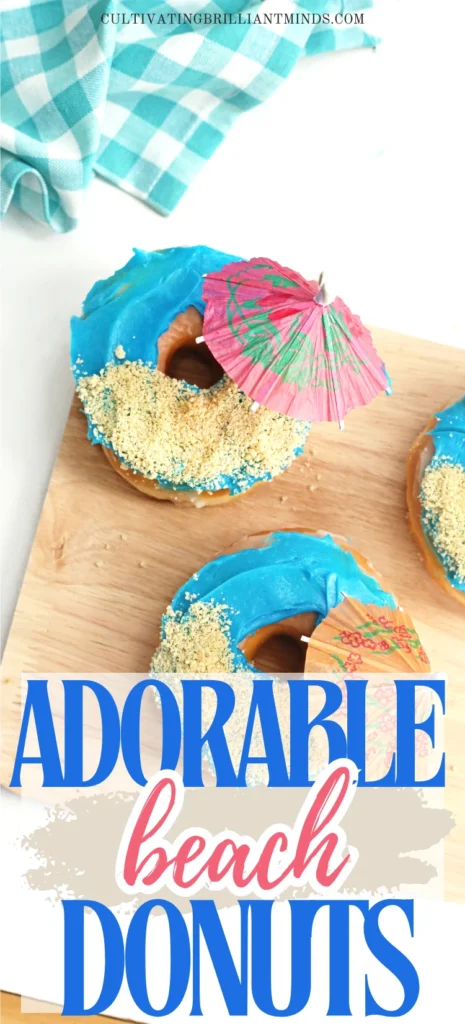 poolside snacks that consist of glazed donuts with blue icing, crushed oreos for sand and a mini umbrella
