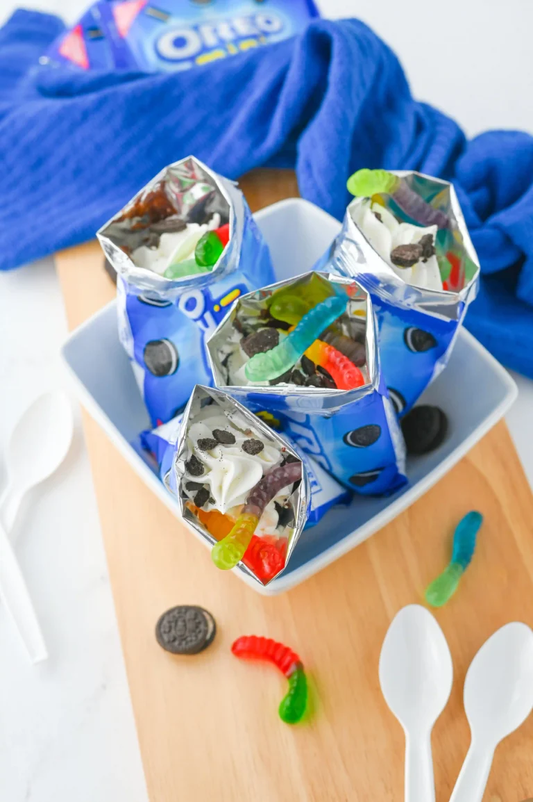 walking dirt cups in mini oreo bags iwth chocolate pudding and gummy worms inside
