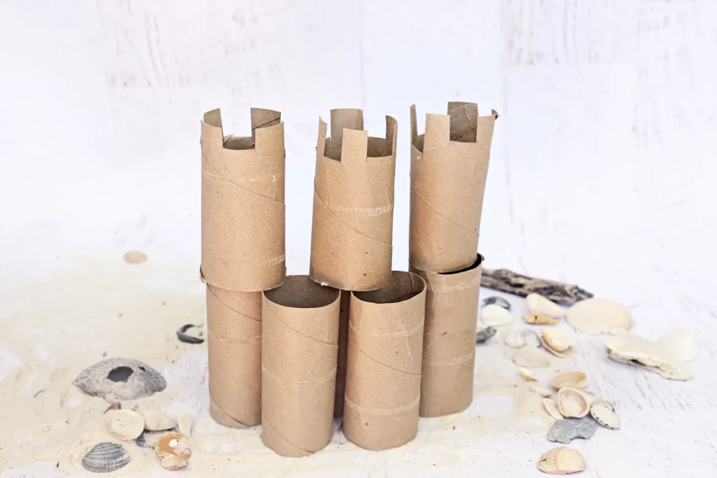 a Build A Sandcastle STEM Activity made out of paper towel rolls and toilet paper rolls