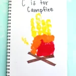 a letter c handprint craft that looks like a campfire