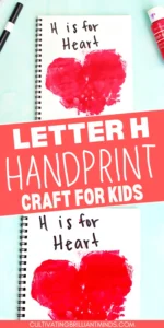 a Letter H Handprint Craft that uses two red handprints to make a heart