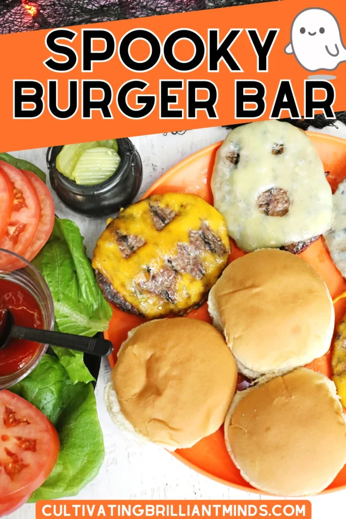 a halloween dinner idea with cheeseburgers that have ghost faces cut out of the cheese