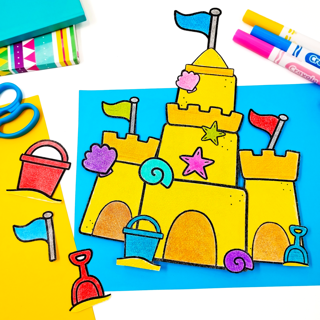 KEEP Sand Castle Craft - Cultivating Brilliant Minds a sandcastle craft on blue paper with markers, scissors, and notebooks in the background