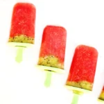 watermelon kiwi popsicles on green popsicle sticks
