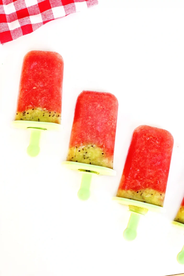 watermelon kiwi popsicles on green popsicle sticks