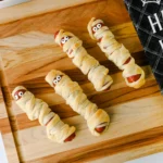 hot dogs wrapped with strips of crescent rolls to look like mummies