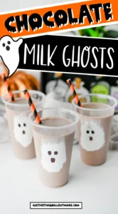 Chocolate Milk Ghost Cups that have marshmallow fluff ghosts in a cup with chocolate milk and an orange and black straw