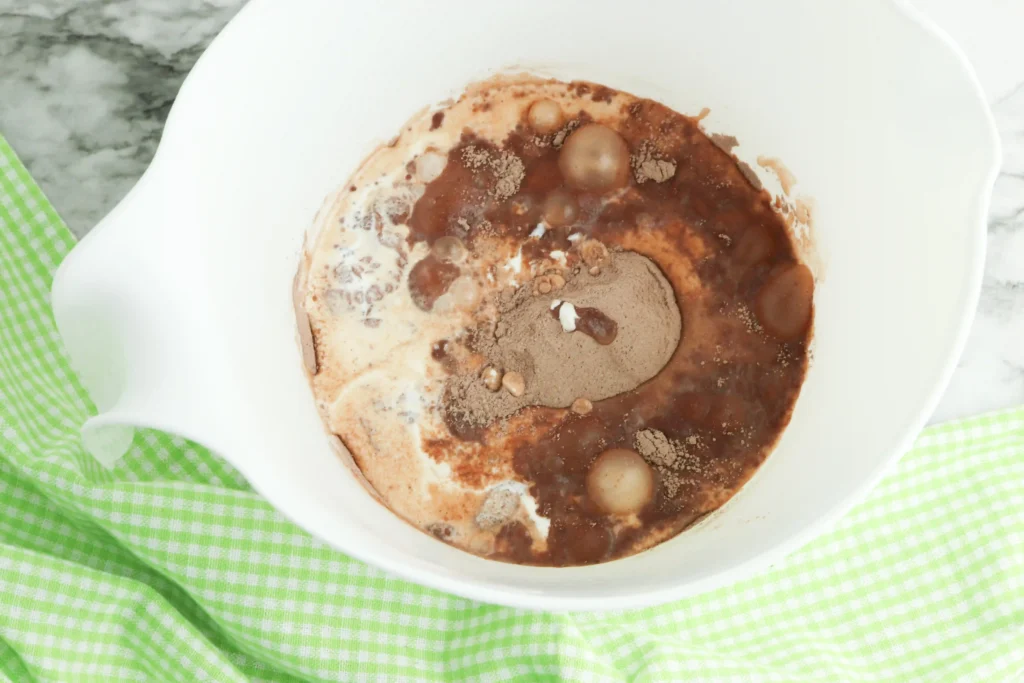 Mini Rudolph Pies - Cultivating Brilliant Minds pudding mix, milk, and heavy cream in a white bowl