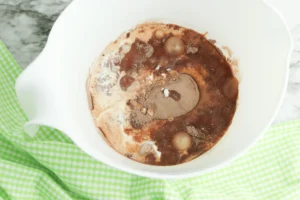 pudding mix, milk, and heavy cream in a white bowl