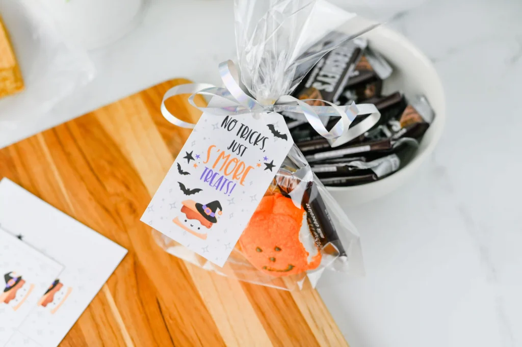 Halloween S'mores Treat Bags - Cultivating Brilliant Minds Halloween S'mores Treat Bags on a wooden board