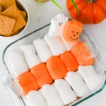Halloween S'mores Sip with marshmallow ghosts and pumpkins