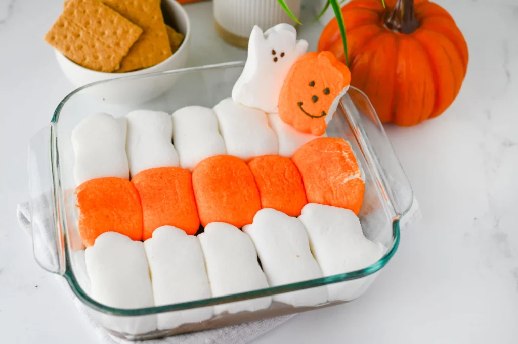 Halloween S'mores Sip with marshmallow ghosts and pumpkins