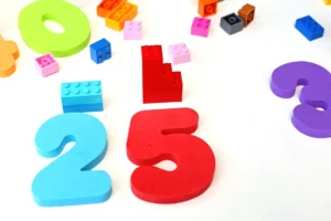 lego math towers with foam numbers 2 and 5 and the same amount of lego blocks