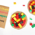 a LEGO Pizza Activity made out of cardboard and legos