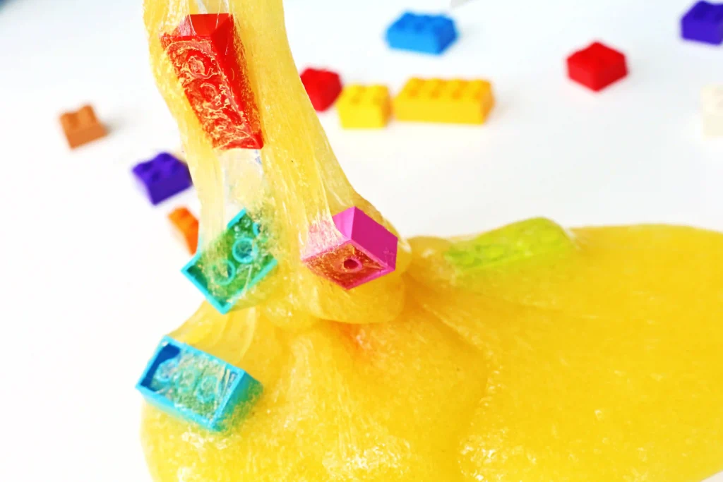 yellow slime with legos in it