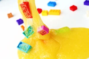 yellow slime with legos in it
