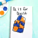 a letter q handprint craft that is designed to look like a quilt with "Q is for quilt"