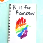 a Letter R Handprint Craft that reads "r is for rainbow"