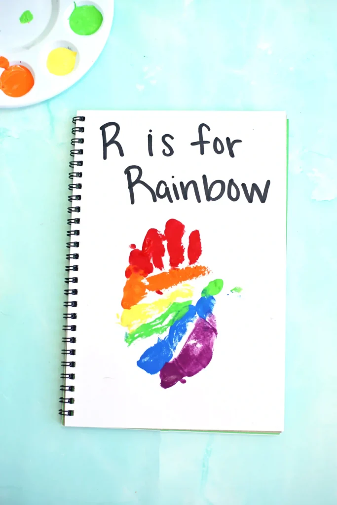 a Letter R Handprint Craft that reads "r is for rainbow"