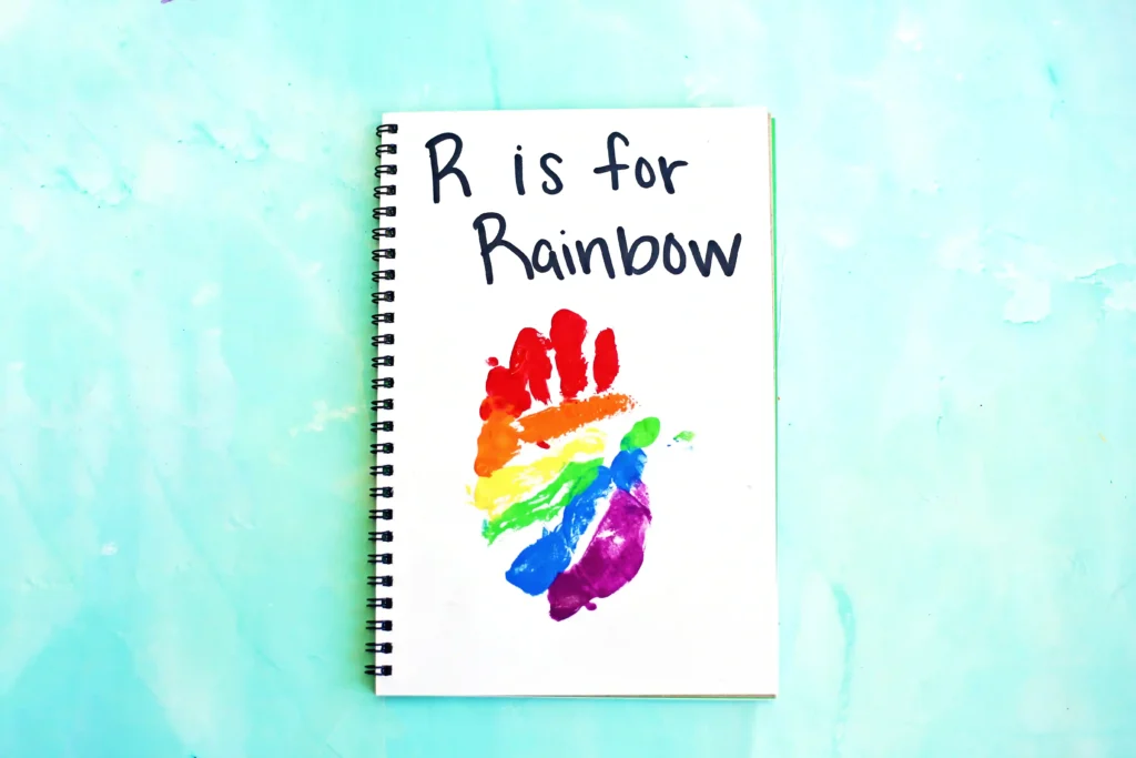 a Letter R Handprint Craft that reads "r is for rainbow"